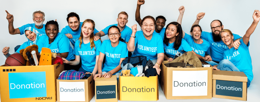 volunteers-helping-out-charity 1